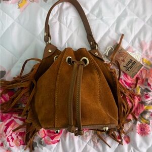 Suede bucket fringe bag